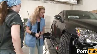 Two sexy lesbians have lesbian sex in the garage of a body shop