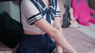 A kawaii schoolgirl, inspired by Eva Elfie, gets creampied and receives a facial