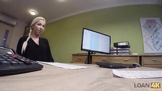 A woman needs a loan for her business, she is interviewed by a stubborn agent