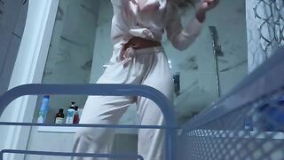 The girl rubs her sweet pussy in the bathroom, no one sees