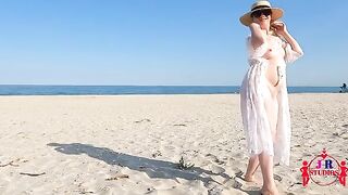A couple has sex on the public beach for the first time, posing nude