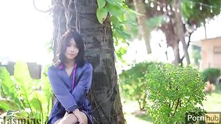 A beautiful Asian girl pees and masturbates in the garden