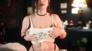 The goth girl in glasses twerks her big tits and sucks a new toy