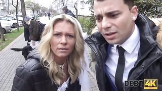 A blonde is having sex with a collector in front of her future husband