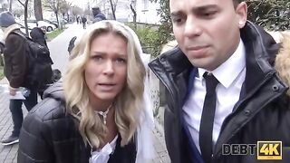 A blonde is having sex with a collector in front of her future husband