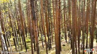 Girl fucked hard by a guy in the woods, her mouth full of cock