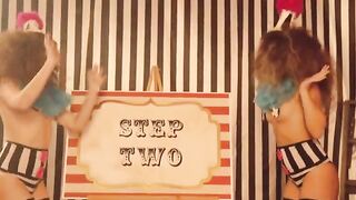 The clowns are having fun with each other in a playful setting