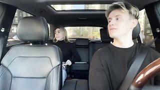 A hot girl is having sex with a taxi driver in his car