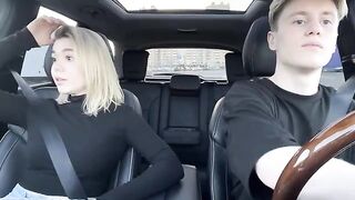 A hot girl is having sex with a taxi driver in his car