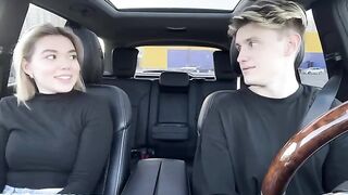 A hot girl is having sex with a taxi driver in his car