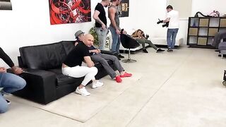 Monika Fox is fucked by 7 guys in a hardcore gangbang scene