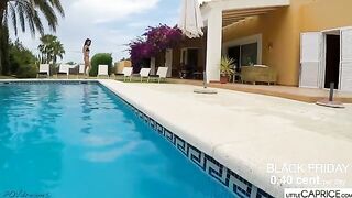 The Little Caprice gives a blowjob to a foreigner right in the pool