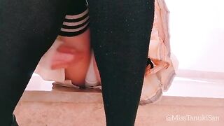 A naughty schoolgirl takes off her panties and rubs herself at her desk
