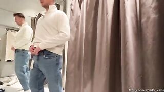 A girl was almost caught while having sex in the fitting room of a shopping mall
