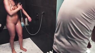 A guy gets his cock sucked in the shower, but not finished
