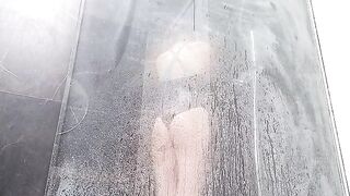 The girl has a wet pussy orgasm in the shower