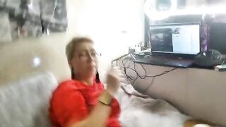 A mature woman is having fun with her pussy on camera in a steamy Russian scene