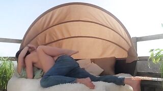 A couple in their 30s enjoy romantic, passionate sex right at home