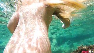 Underwater sex adventure with a hot girl on the beach