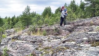 A hot chick is fucking on the stone in a romantic outdoor scene