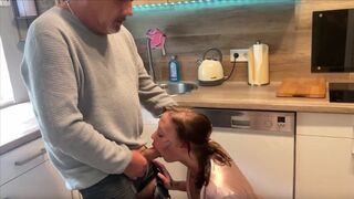 An old fart fucks German amateur in the kitchen, right in front of his wife