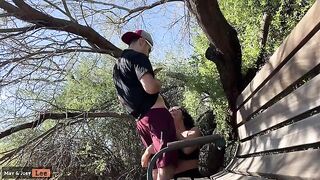 Busty girl almost caught giving head by the lake, damn!