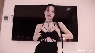 Asian beauty in a black dress was able to experience intense passion