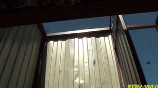 The camera is hidden in the beach cabin. A surprising intimate moment