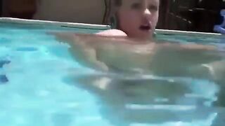 Babe in sexy bikini has sex with a dildo under water