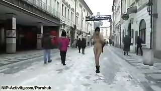The hot student exposes her boobs and ass on the street