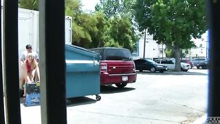 Nude behind the garbage tank captured by a hidden camera