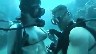 Underwater sex with aqualangists at the bottom of the sea