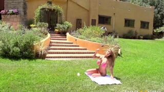 Blonde in sexy dress has sex with a guy on the grass lawn