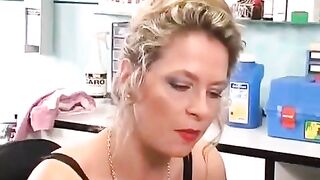 A girl with a pierced clitoris plays with sex toys and rubs herself