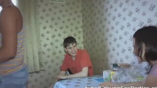 A foursome sex party of two couples, swapping partners and fucking on the couch