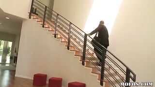 A hot brunette woman fucks with a black man in secret