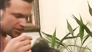 A 40-year-old man plays a joke on the girl by touching her nipples