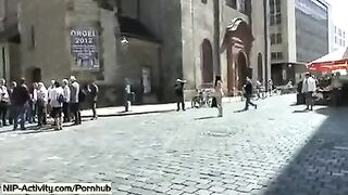 A girl showed her vagina to all the passers-by on the street