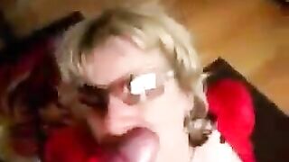 A girl with a big milk can be seen dressing in latex and engaging in passionate sex