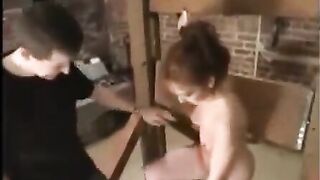 A beautiful girl was tied up and fucked hard in a BDSM twist