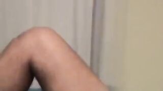 A guy masturbating his cock with his hand watching gay porn