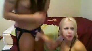 A blonde with big tits chats online and has virtual sex, showcasing strap-on skills