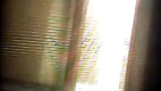 The camera is working properly. A girl is exercising naked