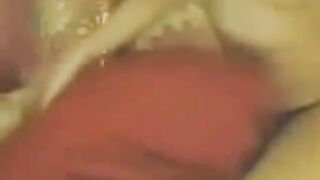 A Chinese babe masturbates in front of a webcam, showcasing her solo performance