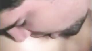 A man has sex with a girl with a strapon and another girl