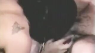 A man has sex with a girl with a strapon and another girl