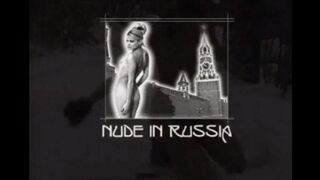 Nude girls have fun with snowballs on the city streets