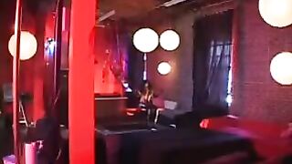 Black woman in a latex suit fiercely took control with intense passion