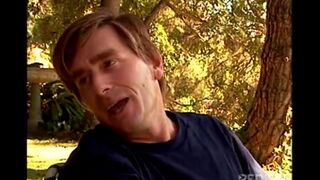 A couple engaged in gentle sex right in nature