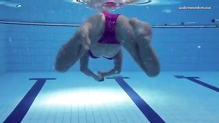Nude beauty swimming in the pool is a very exciting sight to see